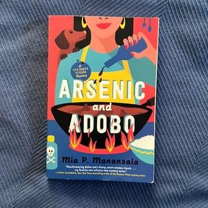 Arsenic and Adobo by Mia Manansala paper back book